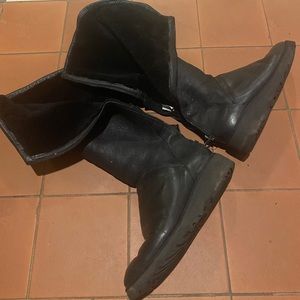 Knee high sheepskin UGG boots slight tear can easily be fixed by cobbler